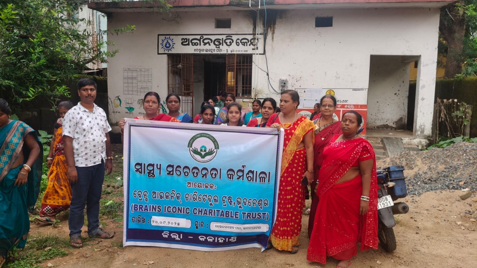 Participants and Brains Iconic Charitable Trust volunteers outside the Anganwadi centre after a Health Awareness Workshop in Kalahandi.