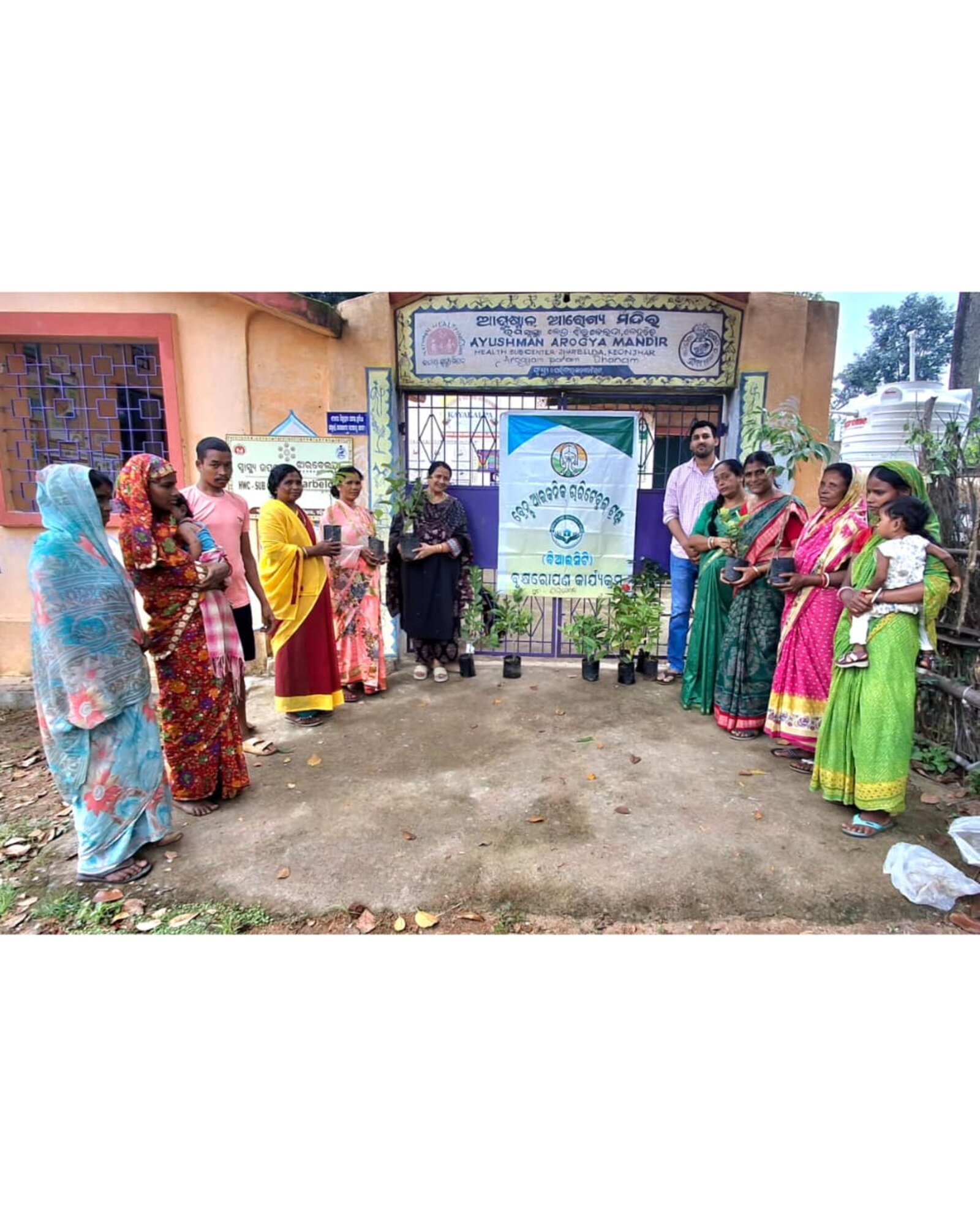 Volunteers and community members at a tree plantation drive outside the Ayushman Arogya Mandir Health Sub-Centre, Jharbeda, Keonjhar district.
